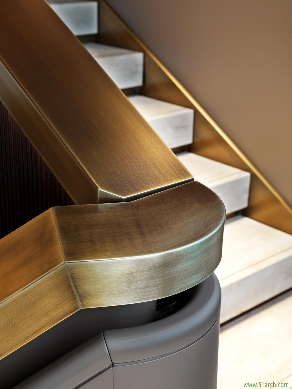 Brioni Boutiques brushed bronze stairwell 