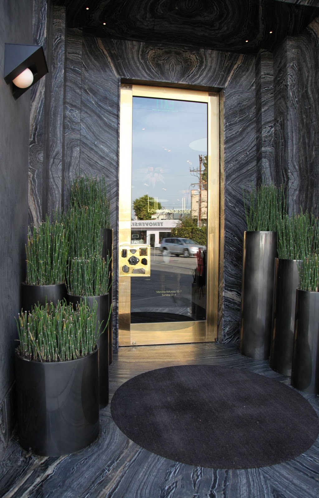 Dark grey marble with gold accent door