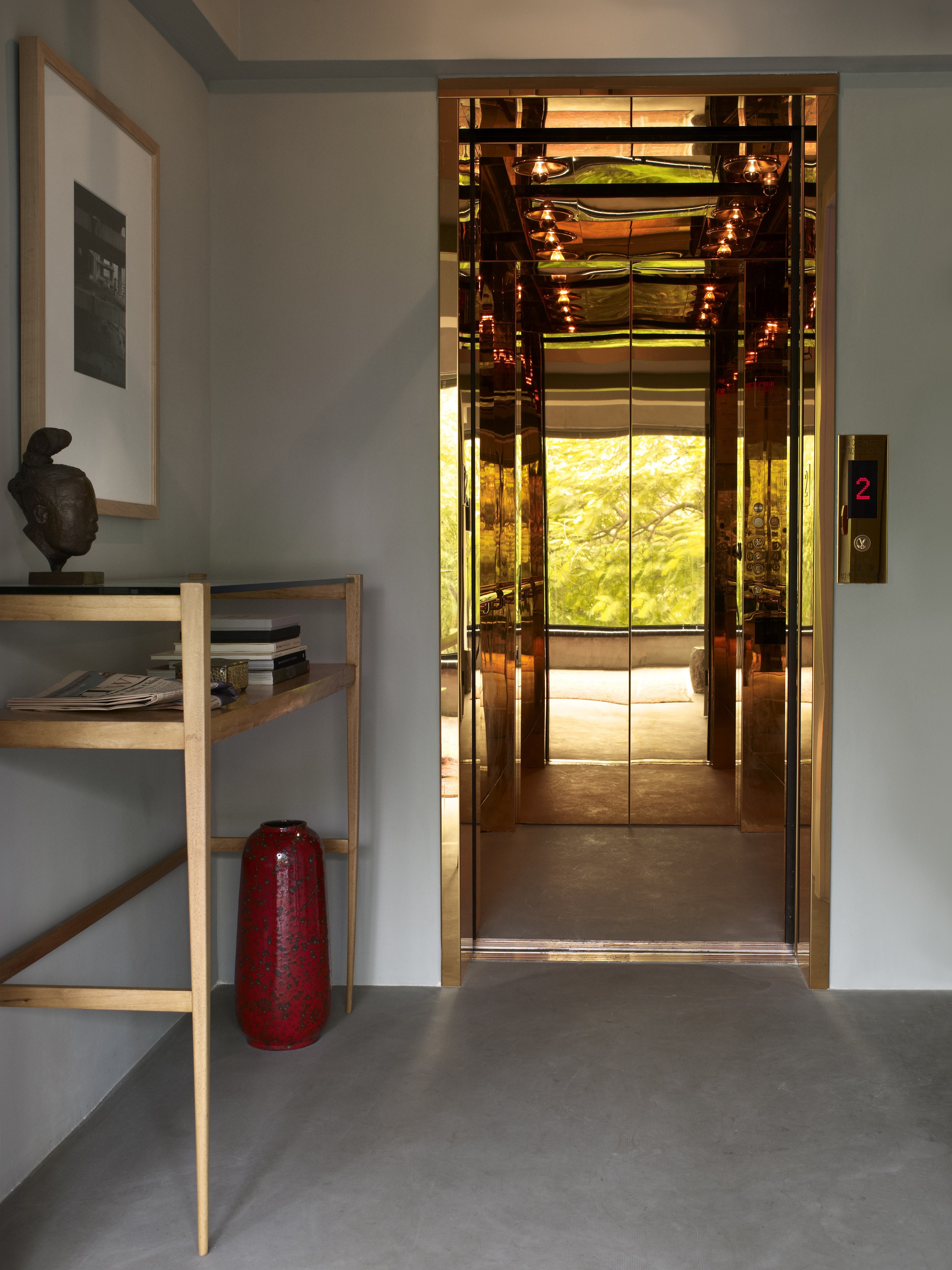 Bronze lift in entrance