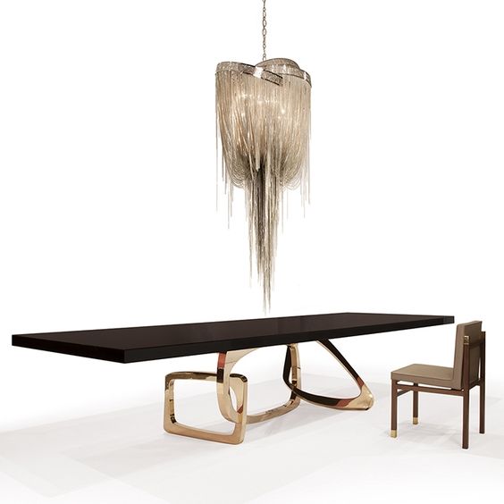 Large wooden table with gold stand by Hudson 