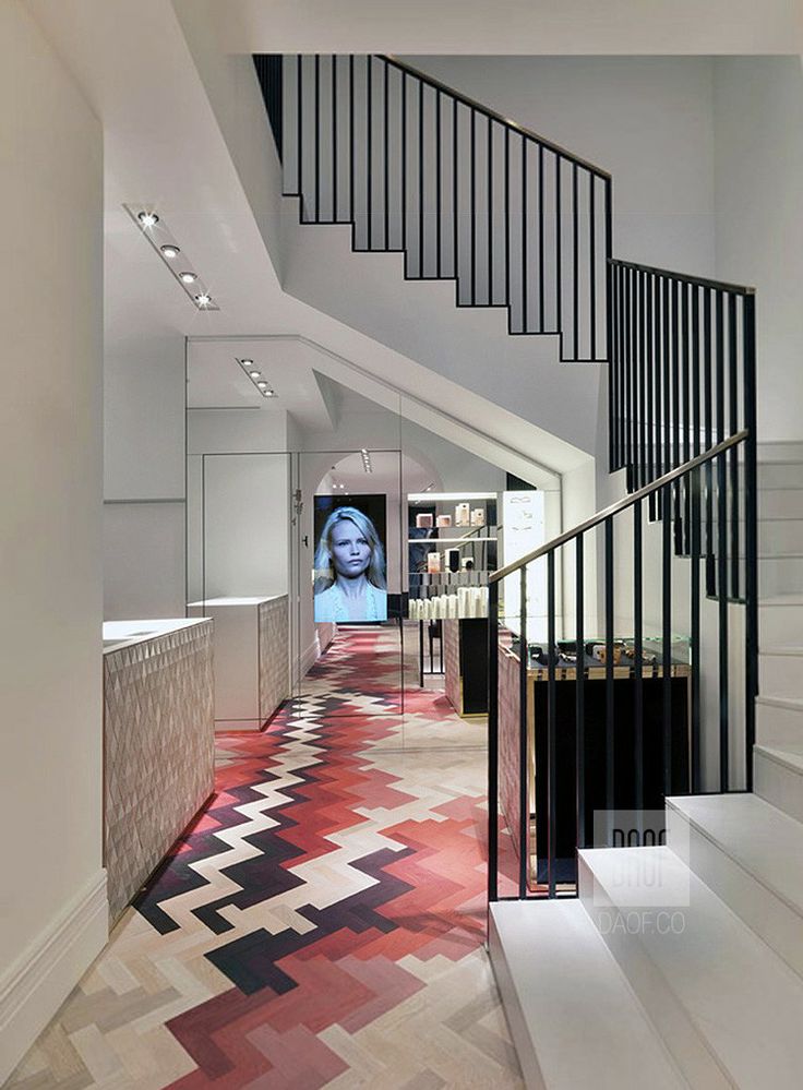 Red parquet floor in entrance